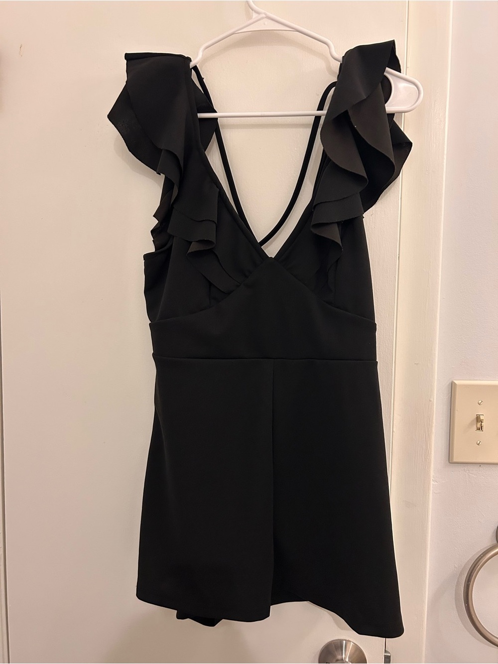 Black Ruffle-Strap V-Neck Romper with Cross-Back Detail